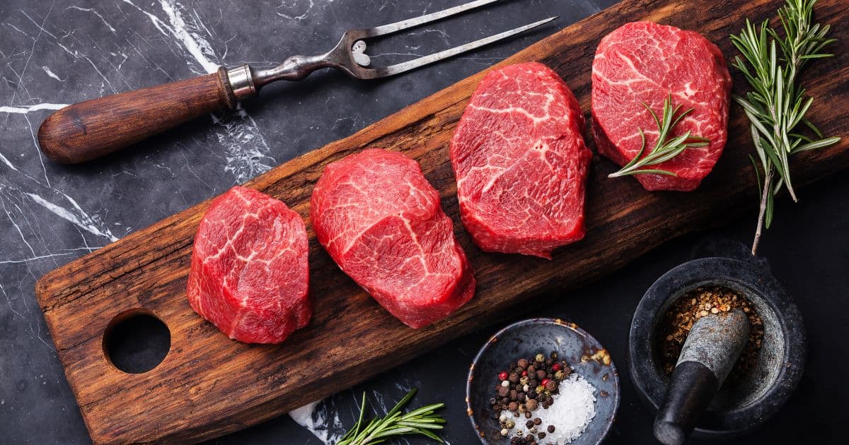 Meat allergy β raw pork and beef on a cutting board.