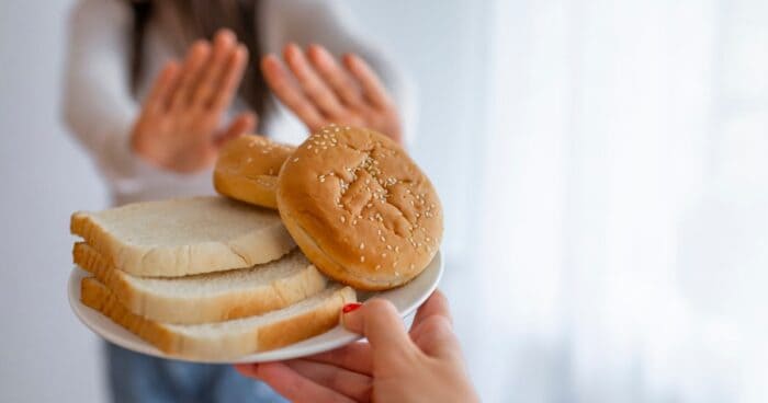 Food intolerance is the body's reaction to certain foods. It is not an immune response but a sensitivity to particular substances in food. Food intolerance results from a lack of digestive enzymes produced by the digestive system and endocrine glands such as saliva, gastric juices, and bile.
