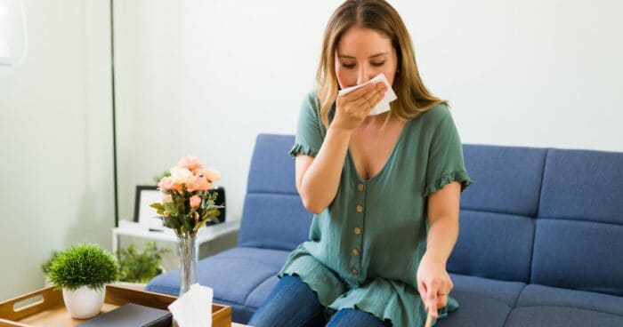 Common dust allergy symptoms include a runny nose, itchy eyes, coughing, shortness of breath, rashes, and general fatigue.